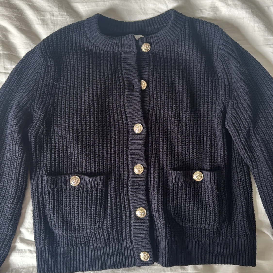 Mörkblå stickad kofta  - 1