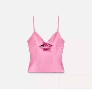 Rosa korsettopp med rosetter från Zara - Supersöt rosa korsettopp från Zara med prislappen kvar och som aldrig har använts💕