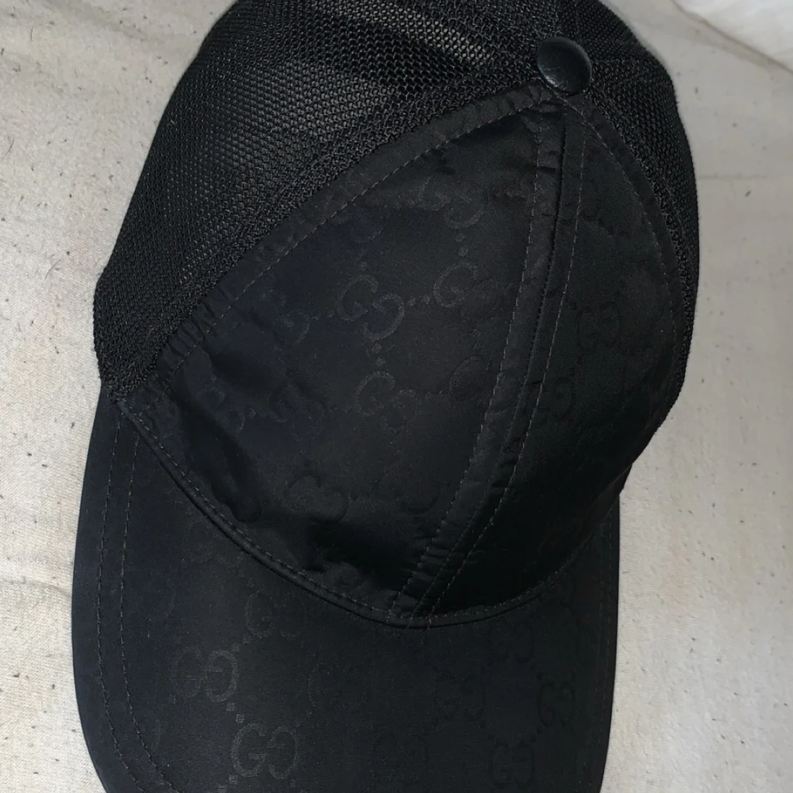 Svart keps från Gucci