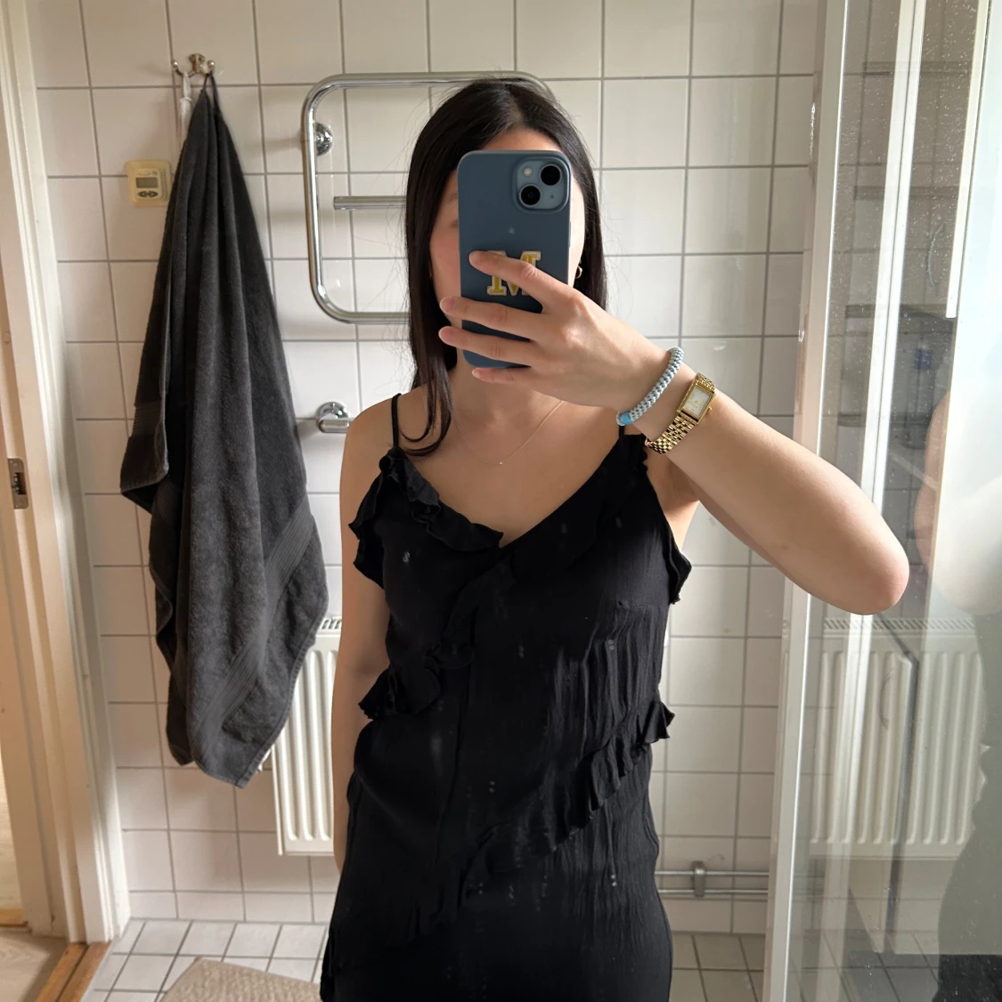 Svart volangklänning från H&M