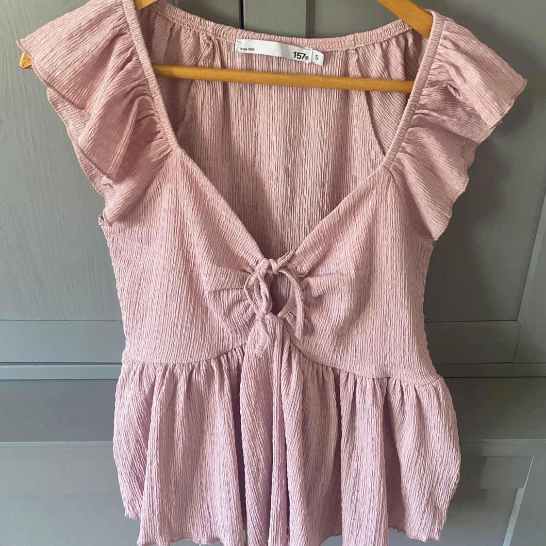 Rosa volangtopp från 157