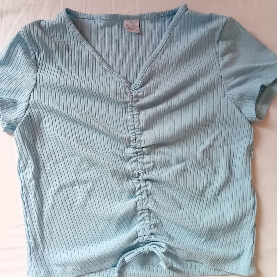 Ljusblå ribbad topp från Lindex - 1