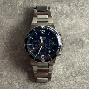 Silverklocka från Pulsar - Väldigt bra skick. Uret är 40mm. Tillkommer ingen låda eller extra länkar. 