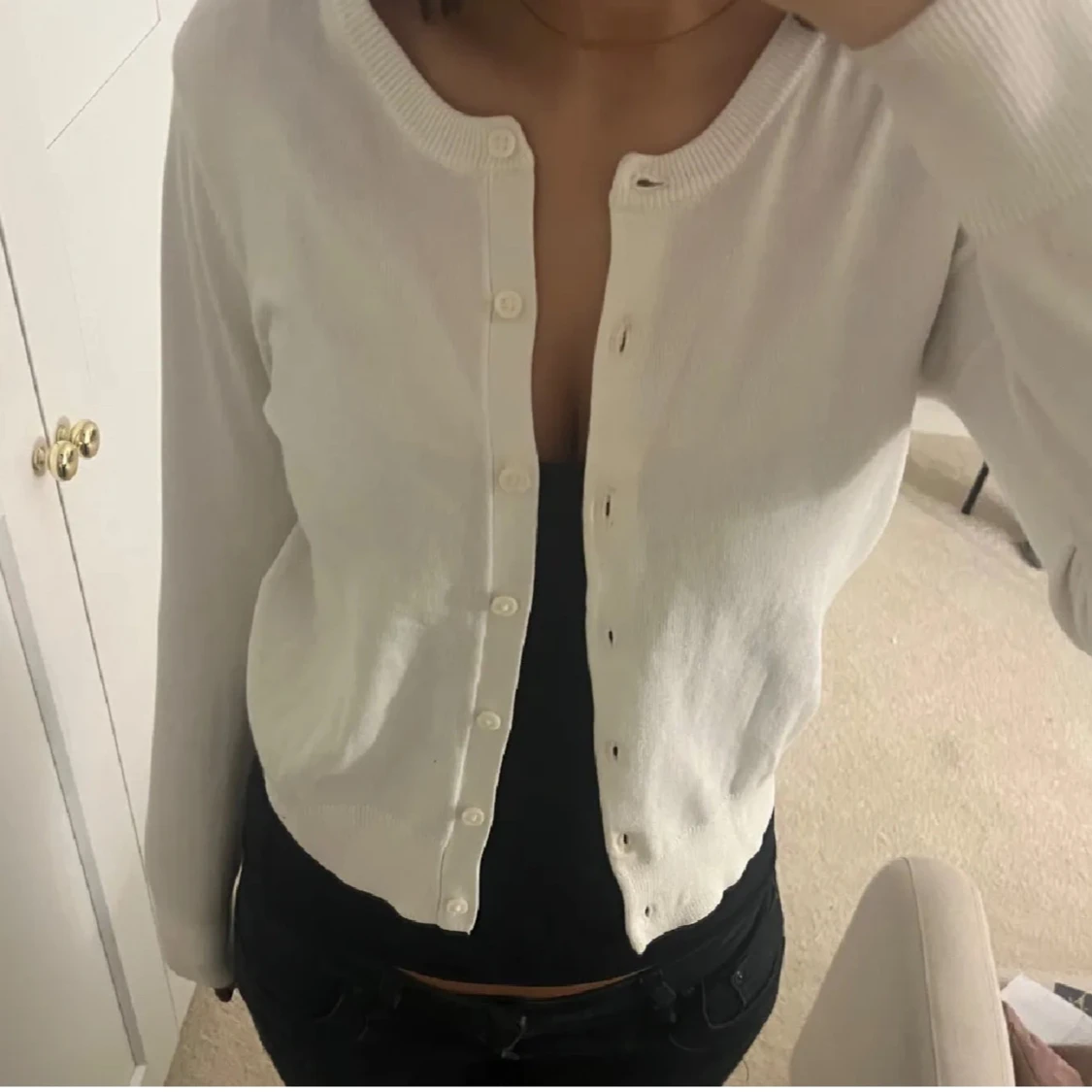 Vit kofta från H&M med knappar