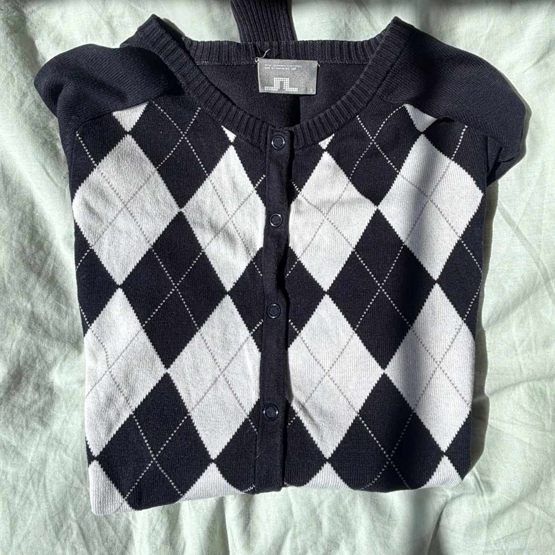 Svart och vit argyle-mönstrad kofta från J.Lindeberg - 4