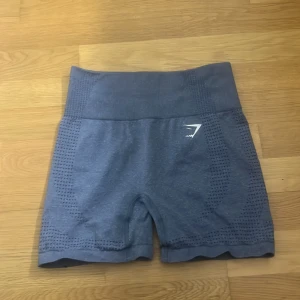 Blå träningsshorts från Gymshark - Säljer ett par ljusblå shorts från gymshark
