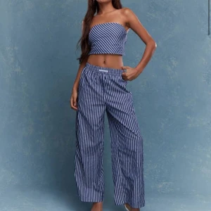 Topp och byxor  - Endast en gång använda. 