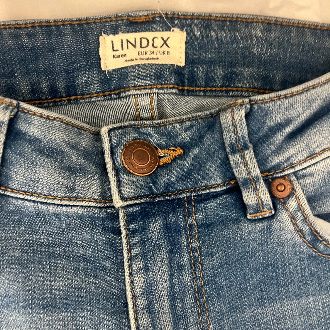 Blå jeans från Lindex, storlek 34 - 1