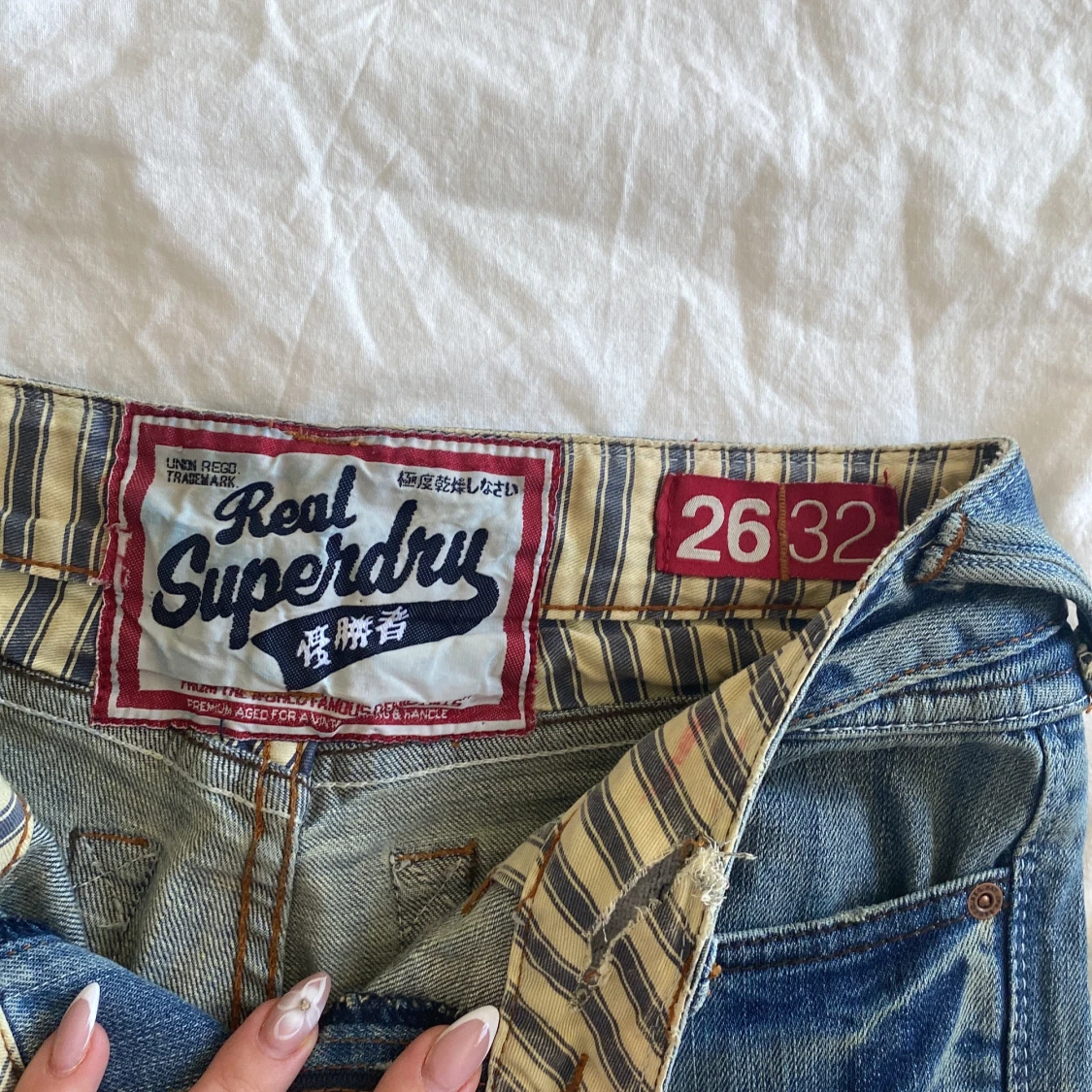 Blå bootcut jeans från Superdry - 2