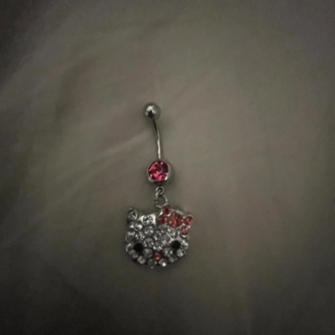 Hellokitty navelpiercing  - 90