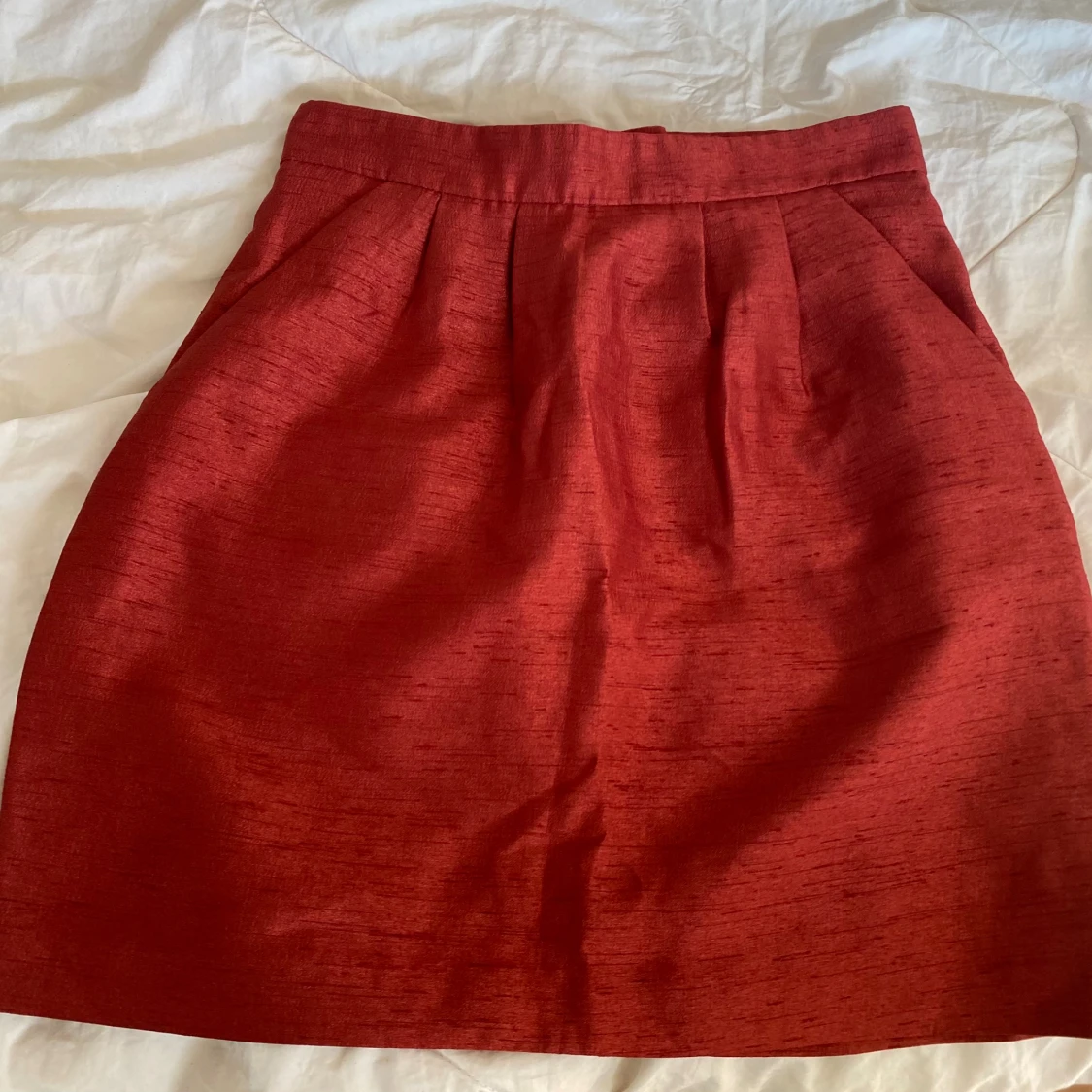 Kort mörk orange kjol  - 90