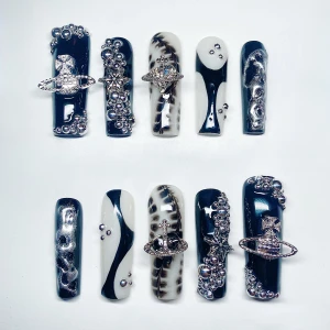 Black & White Press On Nails  - Press On Nails -  Sizing M   WHAT COMES WITH THE NAIL SET: • ONE NAIL FILE • ONE NAIL BUFFER • ONE CUTICLE STICK • 2 ALCOHOL WIPES • ONE NAIL GLUE  If you are interested in customised press on nails you can DM me on IG: the.nailz.junkie