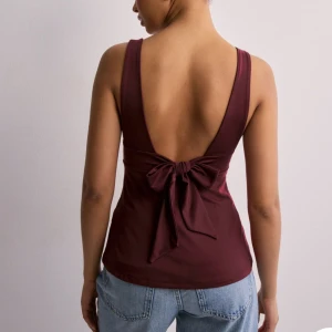 Topp från Nelly  - Säljer den här superfina toppen som är helt slutsåld på Nelly!  Säljer endast vid högt bud då jag är osäker på om jag vill sälja. Den är oanvänd och i superbra skick. 💗