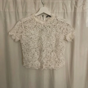 Spets topp - En spets topp i bra skick i storlek S
