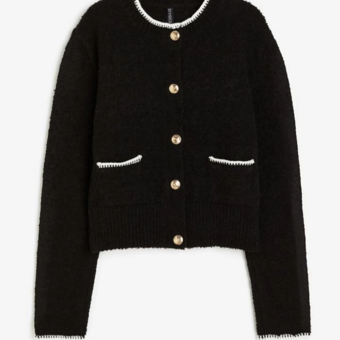 Strukturstickad kofta - 90