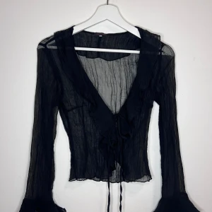 see-through top - sitter lite tightare än storleken (s-m)