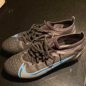 Nike mecurial vapor 14 pro  - Storlek 40,5. Skicket är mycket bra/ny skick. Har använts ett fåtal gånger men blev för små snabbt. Konstgräs/naturgräs dobbar.