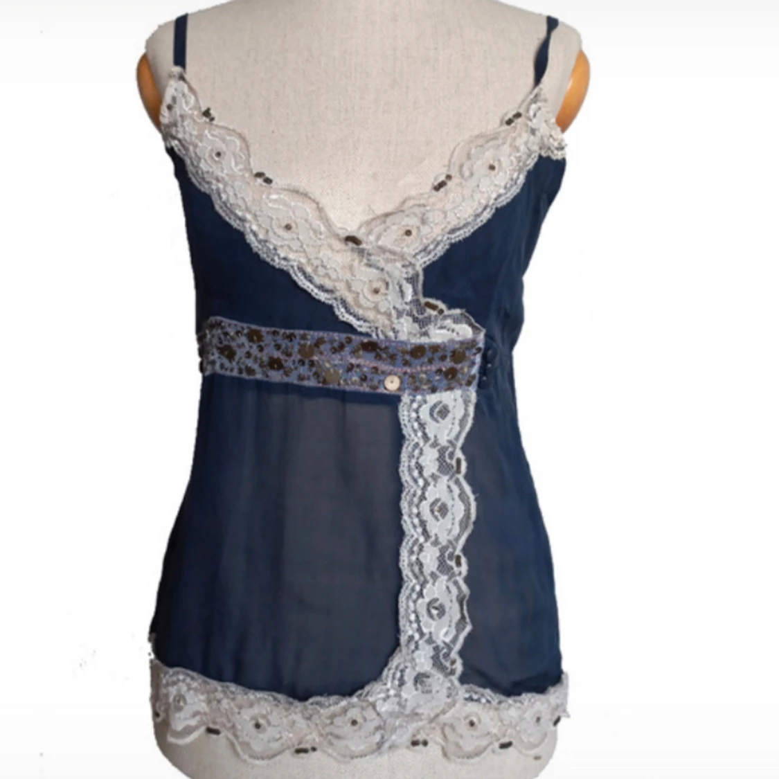 Söt mörkblå spetstopp