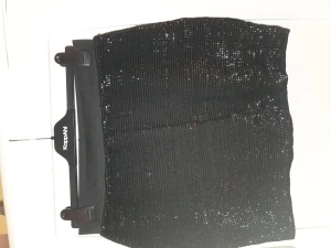 Kort kjol - Oanvänd kort kjol med glitter.