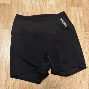 Gymshark shorts i NYSKICK - Shorts från Gymshark i storlek xs. Bara använda 2 gånger, ser helt nya ut