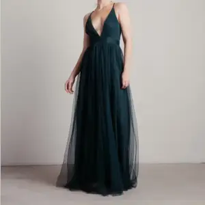 Oanvänd high slit klänning från tobi.com (USA) 
