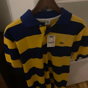 Lacoste polo shirt - Lacoste polo shirt oanvänd