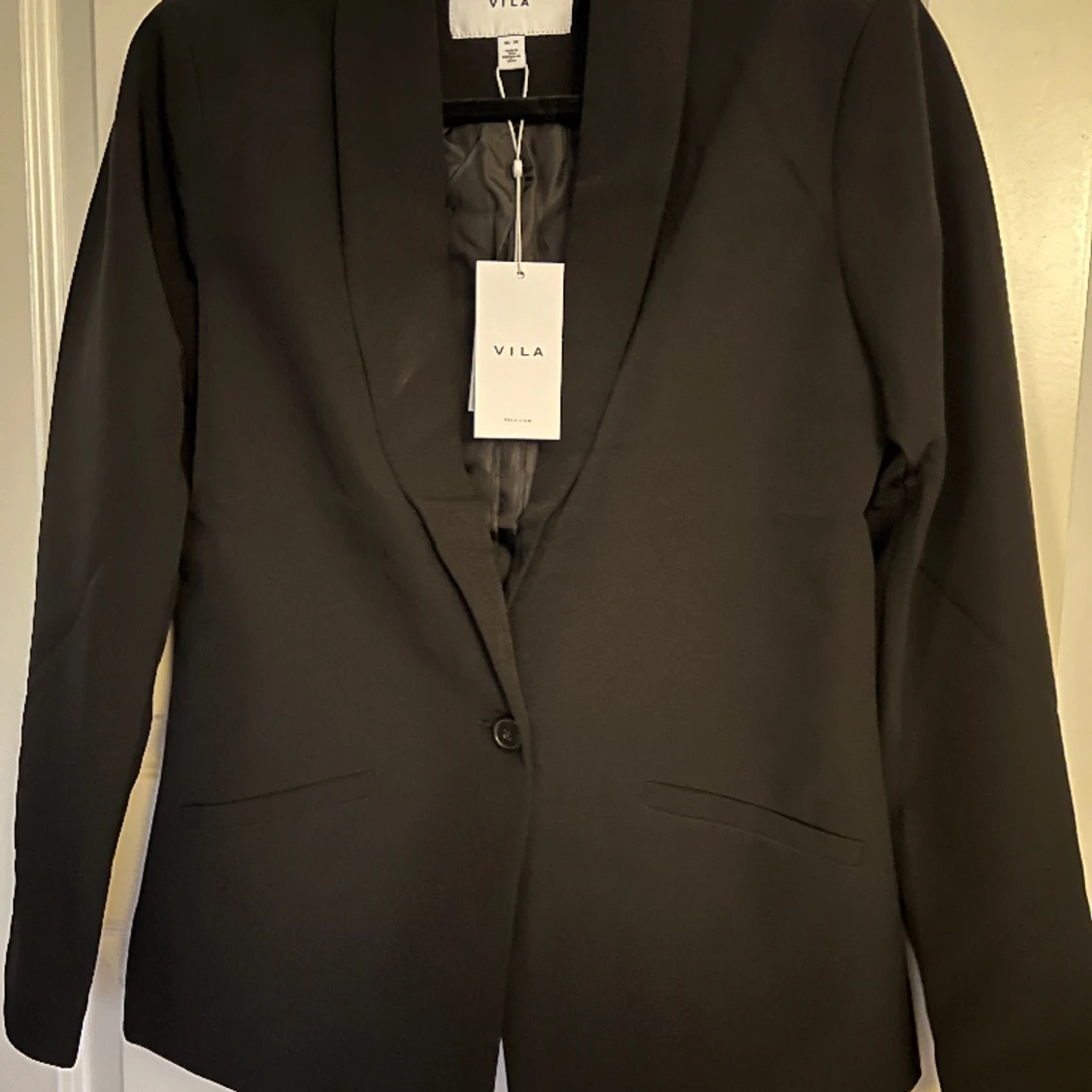 Oanvänd kavaj storlek 38