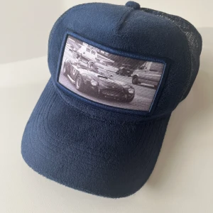 Keps från Emilip Pendenza - Marinblå keps från Emilio Pendenza Går att justera storleken Bra skick