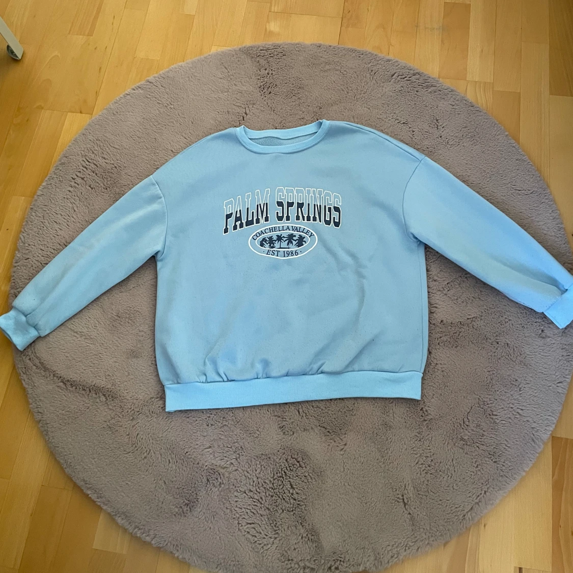  Ljusblå mjuk tröja - 91