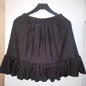 minikjol  - sant i storleken, elastisk material 