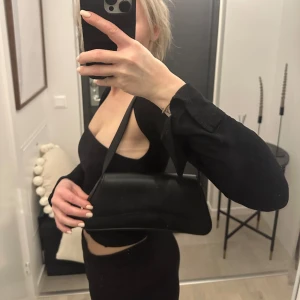 Axelväska - Axelväska från GinaTricot. Använd fåtal gånger 