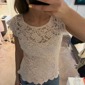 Söt topp - Sött spetstopp som är smutsrosa. 