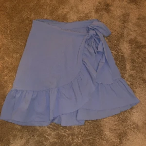 Volang kjol - Använd en gång, normal i storlek