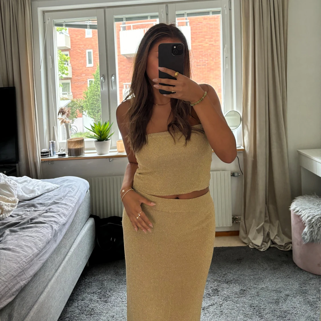 Guldig topp från Gina tricot