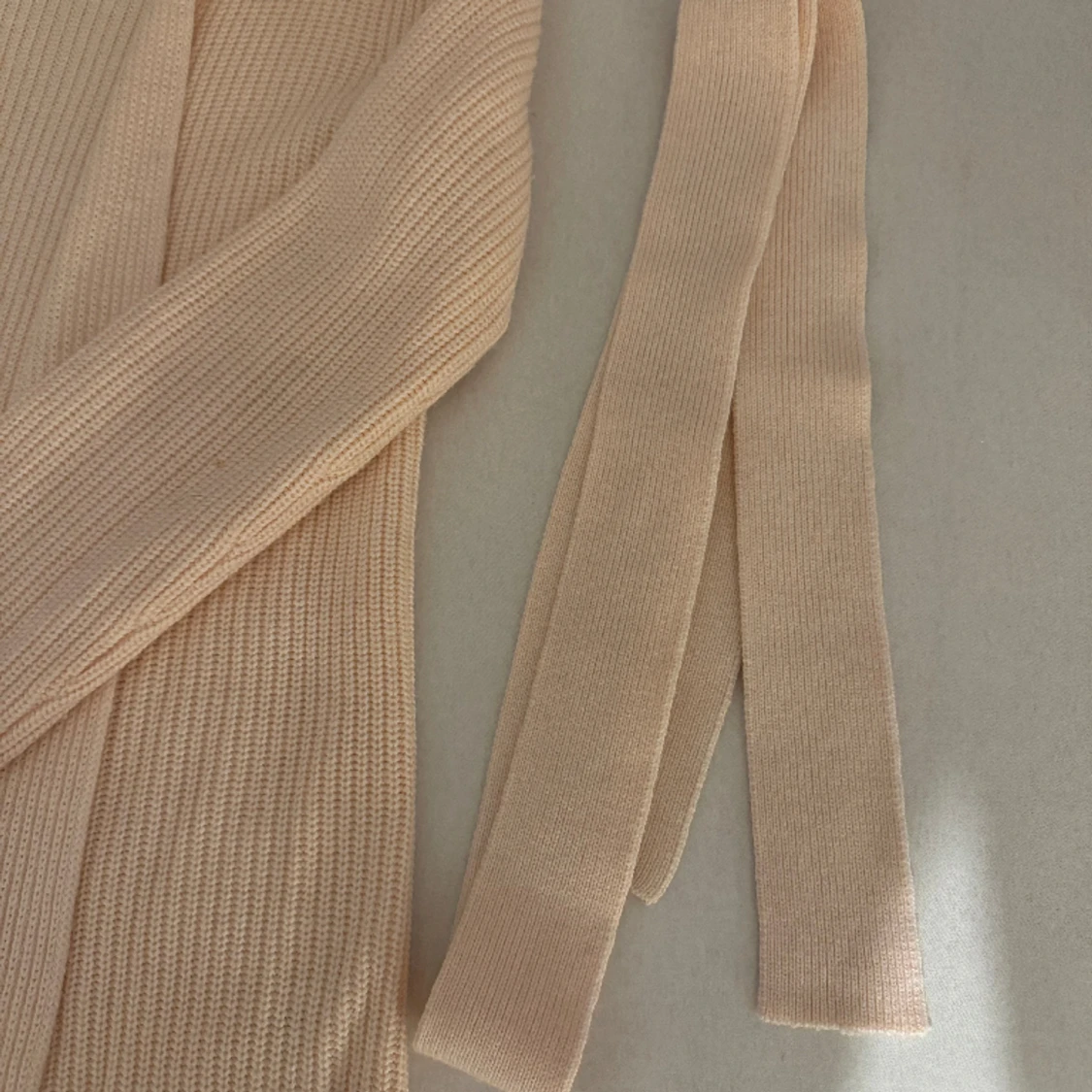 Stickad lång kofta  - 91