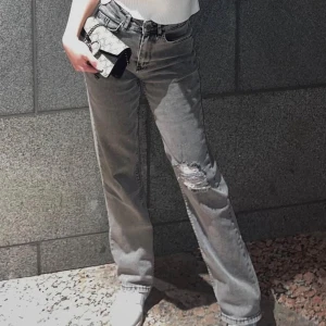 Lågmidjade jeans - Lågmidjade ripped jeans 