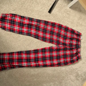 Red pyjama pants  - The item hasn’t been worn that much and has been taken care of very well. The clothing has no issues whatsoever and no damages. The item has also been cleaned very well so it’s not dirty or anything.