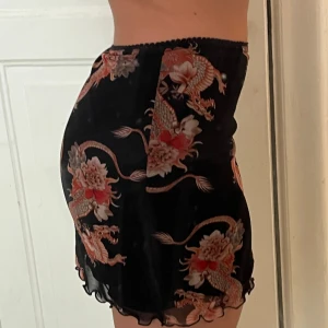 Mini skirt Urban outiftters - Jättefin Kjol som även går att använde som tube-topp! 