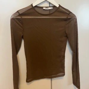 Mesh tröja - Mesh tröja ifrån NA-KD! Aldrig använd! Nypris 200kr