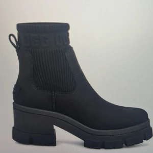 Ugg waterproof platform Chelsea sock boots  - new in box (never worn)! sold out everywhere, unfortunately they’re too big for me