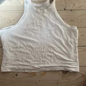 Ett vitt linne/topp från Lindex i storlek M 