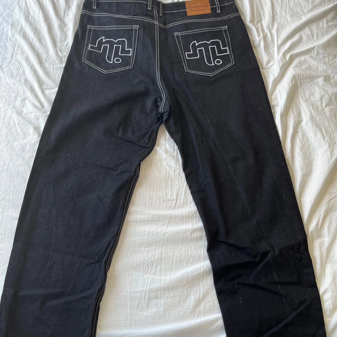 Svarta mokovel jeans - 90