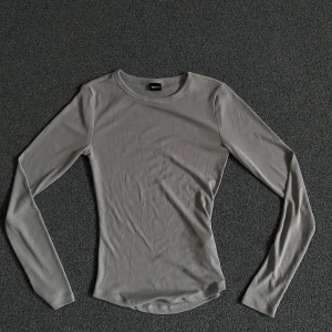 Ljusblå genomskinlig tröja - Jättefin ljusblå tröja som är lite genomskinlig