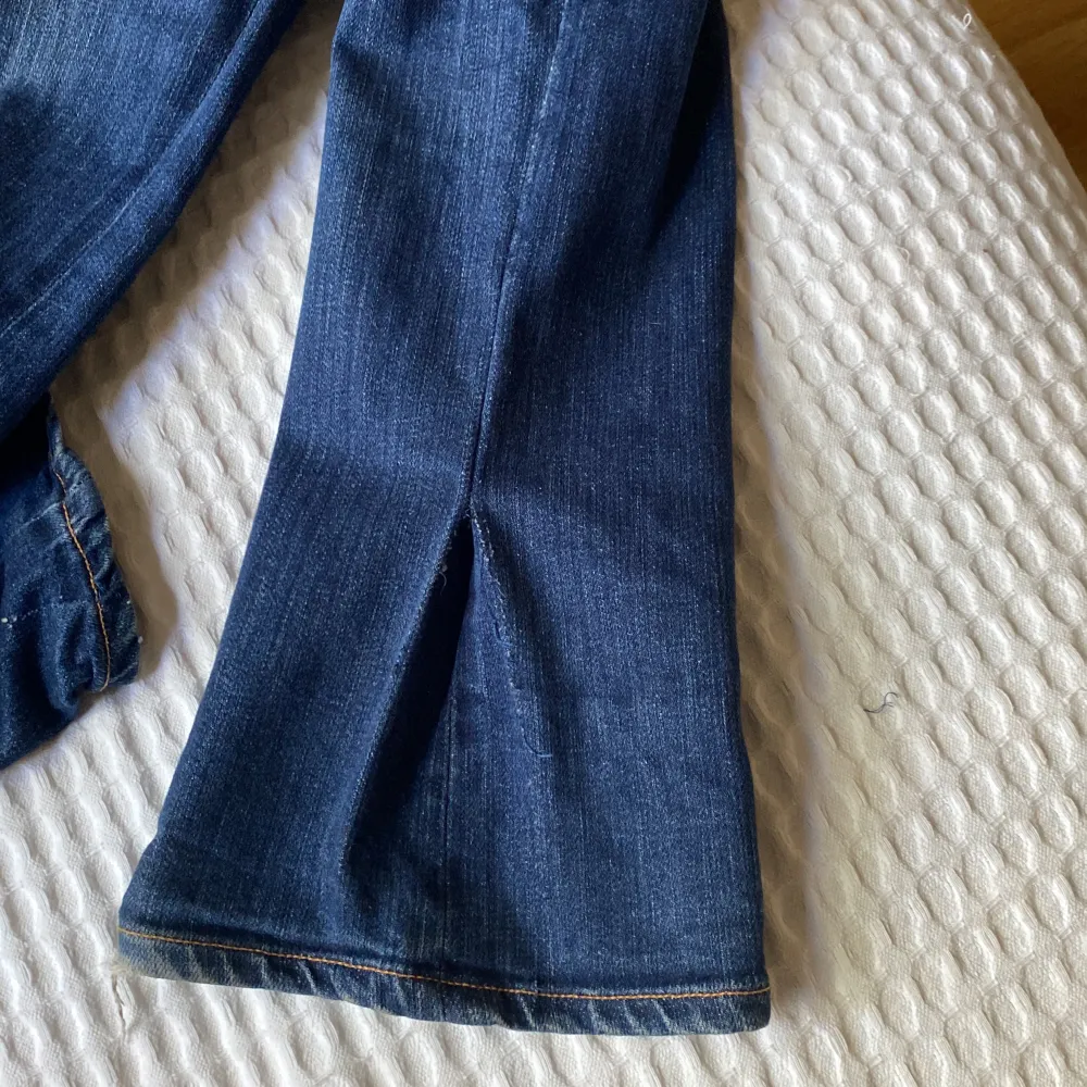 Lågmidjade utsvänga nudie jeans . Jeans & Byxor.