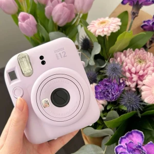 Intax Camera mini 12 - lila  - Är jötte ny, har bara använt 1 gång, jättefin och funkar jättebra! 