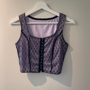 Corset top - So cute! Never worn. From unif :) selling for cheap