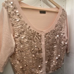 Bolero med paljetter - Söt, passar M