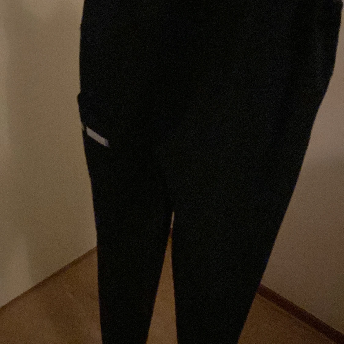 Grå,svarta ridbyxor  - 90