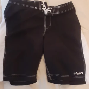 Bad Skjorts - använt engång , svart bad skjorts