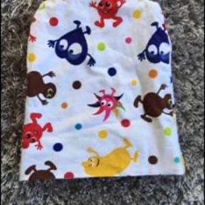 Nyfödd mössa  - Nyskick inget anmärka. Kan skickas mot portokostnad 